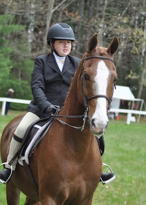 Chrislar student  at horse show ready to go in the ring