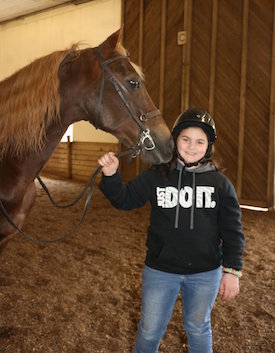 Chrislar student with horse