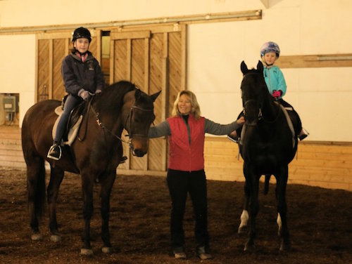 Chrislar group at horse camp day tacked up and ready to ride