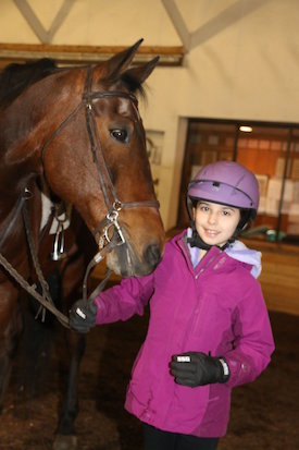 Chrislar student with horse