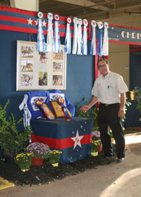 Larry displaying the OKC awards